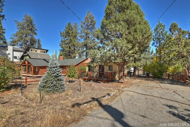 view of front of house with a wooden deck