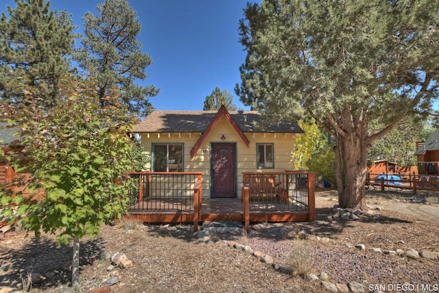 view of front of home with a deck