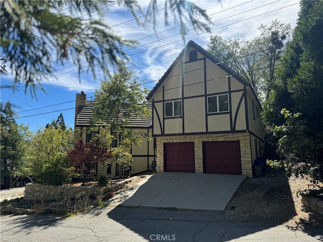 tudor house with a garage