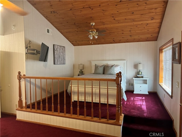 carpeted bedroom featuring lofted ceiling, wood ceiling, and ceiling fan