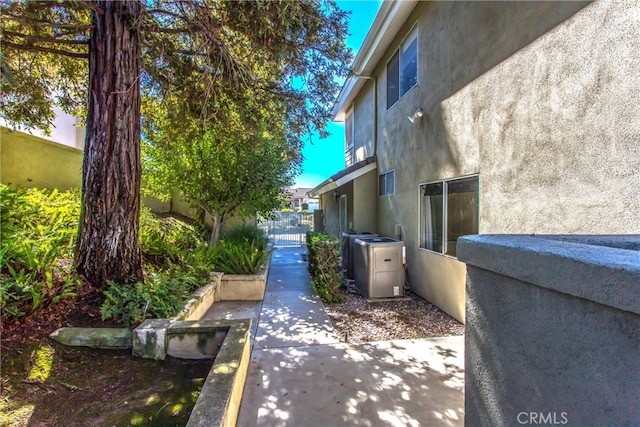 view of home's exterior with central air condition unit