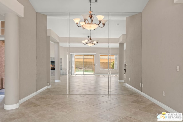 interior space featuring a notable chandelier