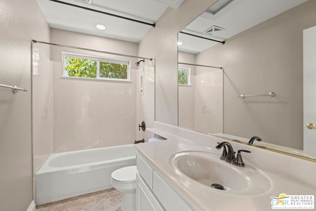 full bathroom with vanity, shower / bath combination, tile patterned flooring, and toilet