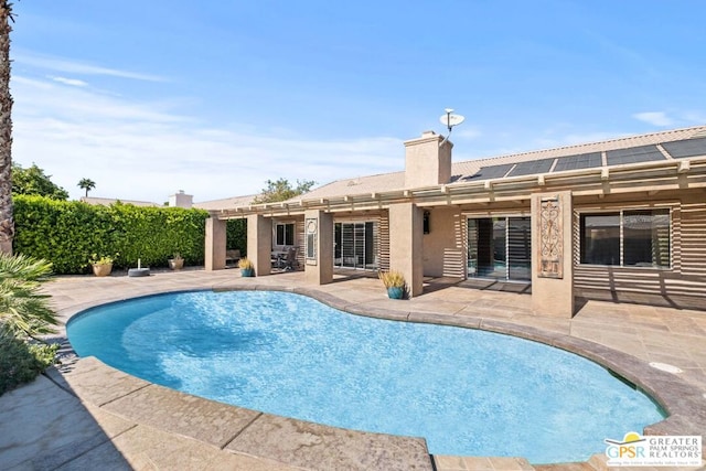 view of pool with a patio