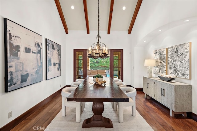 dining room with french doors, dark hardwood / wood-style floors, high vaulted ceiling, and a notable chandelier