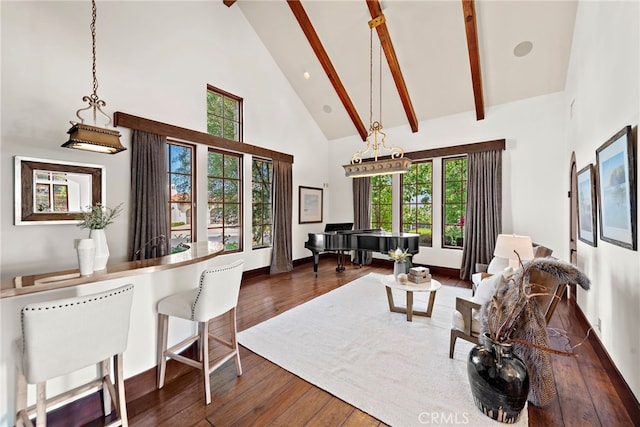 living room featuring beam ceiling, dark hardwood / wood-style floors, and high vaulted ceiling