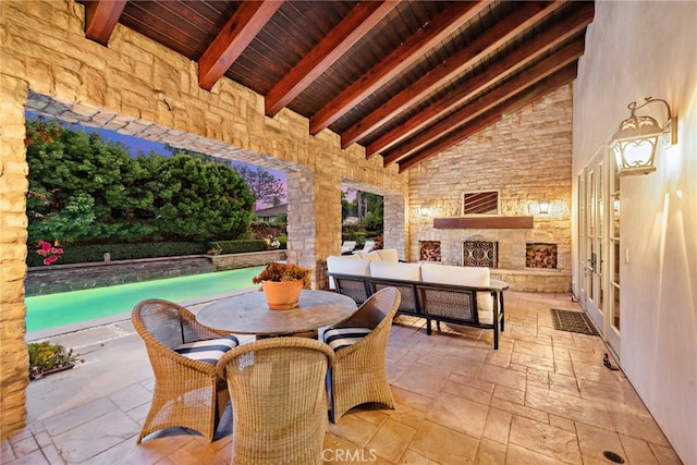 view of patio / terrace featuring an outdoor living space and french doors