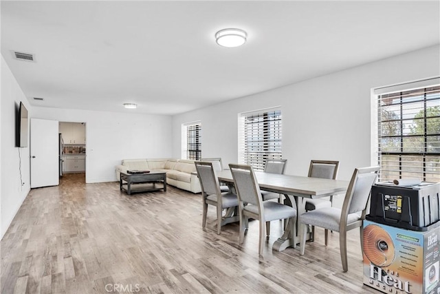 dining area featuring light hardwood / wood-style flooring