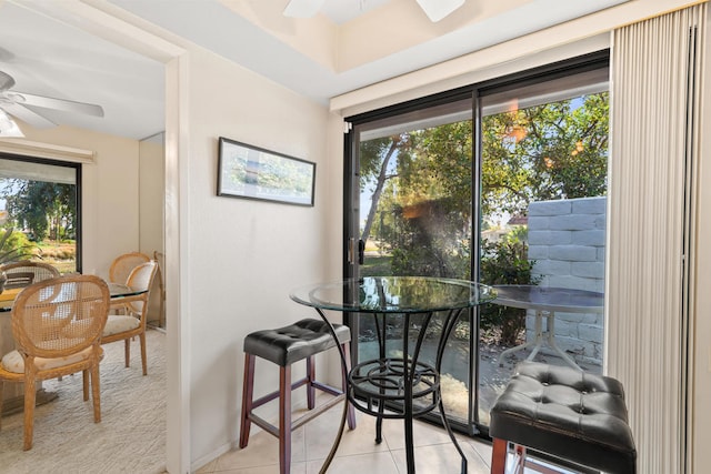 interior space featuring ceiling fan