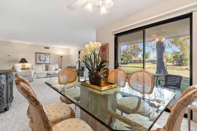 dining room featuring ceiling fan