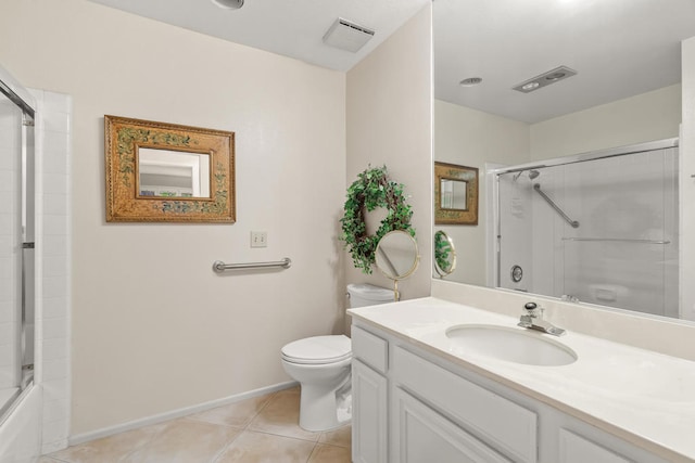 full bathroom featuring tile patterned flooring, shower / bath combination with glass door, vanity, and toilet