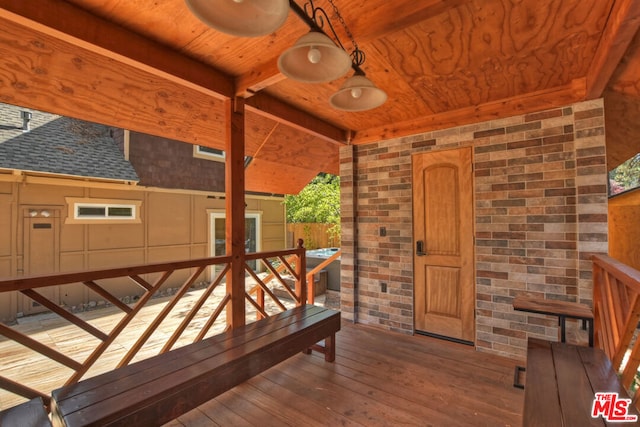 exterior space with ceiling fan