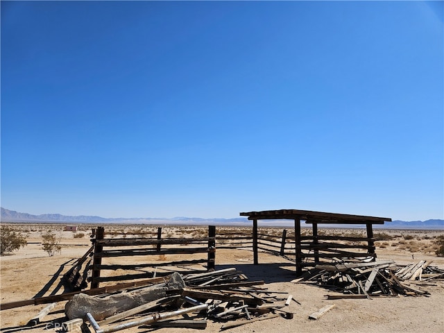 exterior space with a mountain view and a rural view