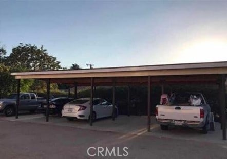 view of car parking featuring a carport