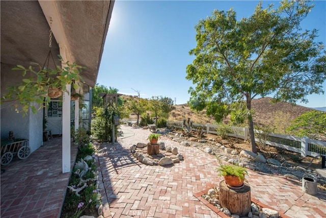 view of patio with a mountain view