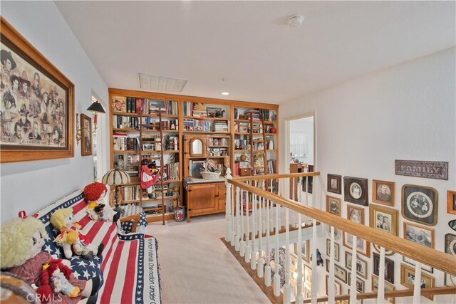 interior space featuring light colored carpet