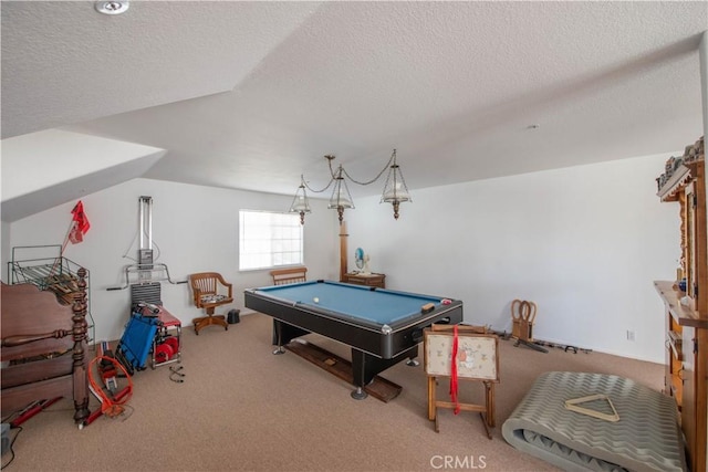 rec room with vaulted ceiling, carpet, a textured ceiling, and pool table