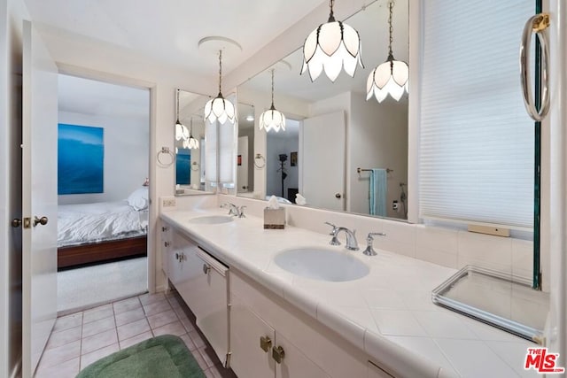 bathroom featuring tile patterned floors and vanity