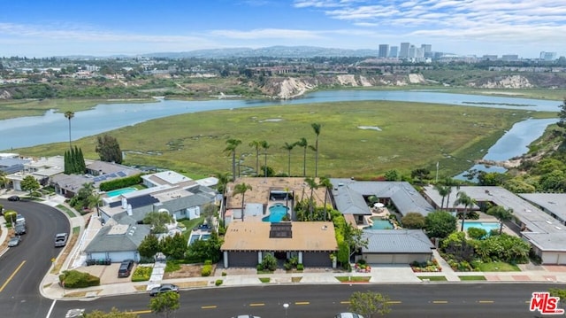 drone / aerial view with a water view