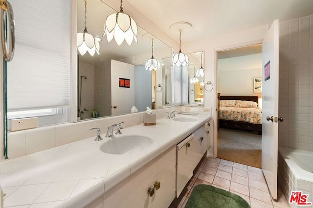 bathroom with vanity and tile patterned flooring