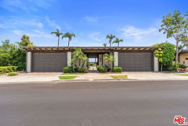 single story home with a garage