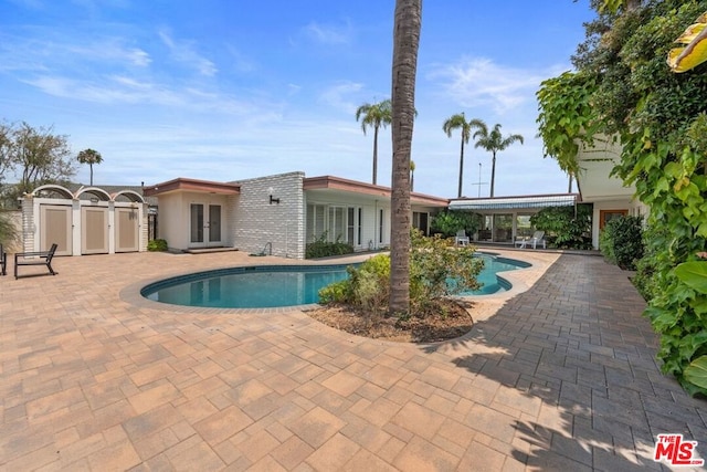 view of pool with a patio