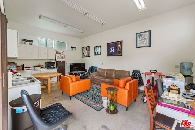 living room featuring sink