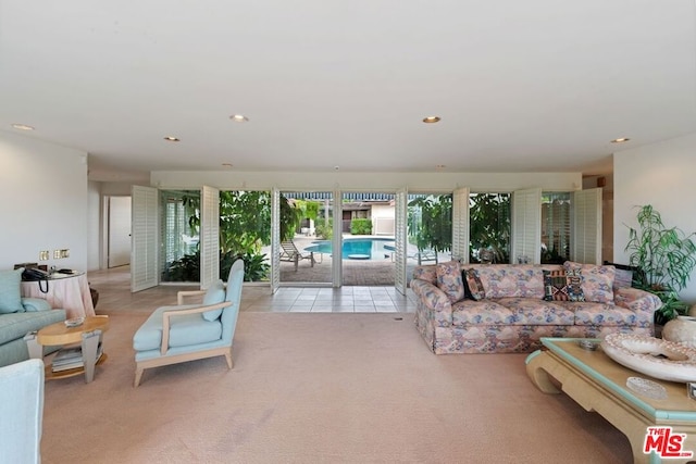 living room featuring light colored carpet