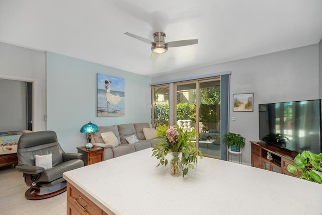 living room with ceiling fan