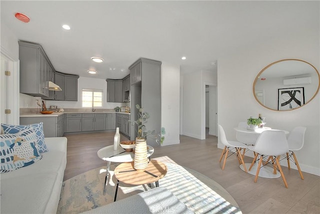 living room with light hardwood / wood-style floors