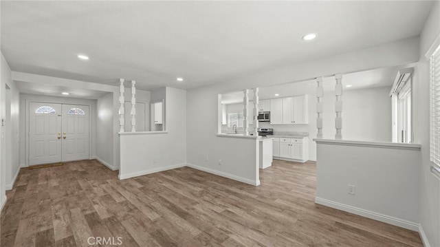 foyer entrance featuring light hardwood / wood-style flooring