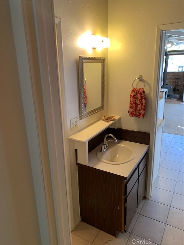 bathroom with vanity and tile patterned flooring