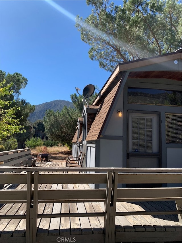 deck featuring a mountain view