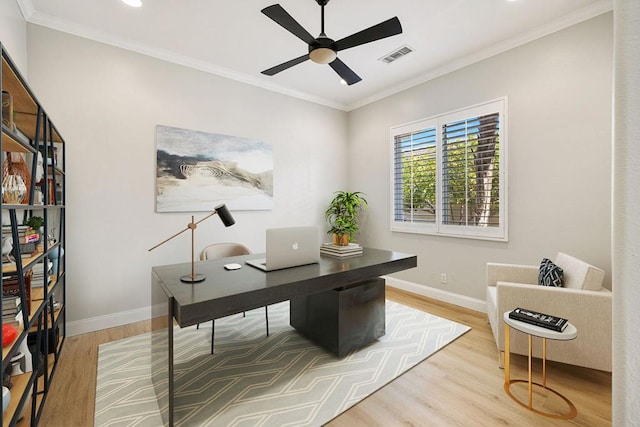 office area with crown molding, ceiling fan, and light hardwood / wood-style flooring