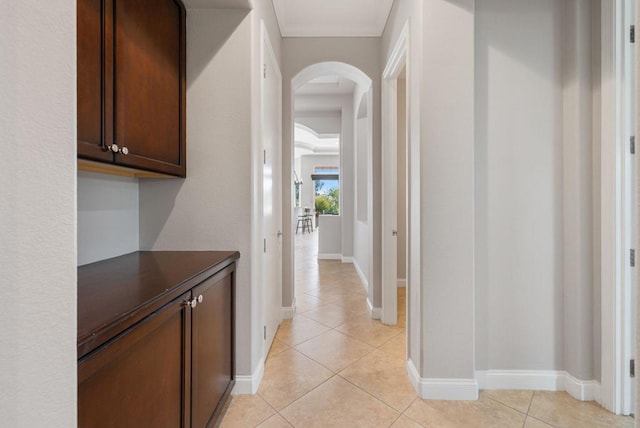 hall featuring light tile patterned flooring