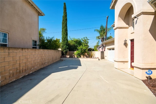 exterior space with a garage