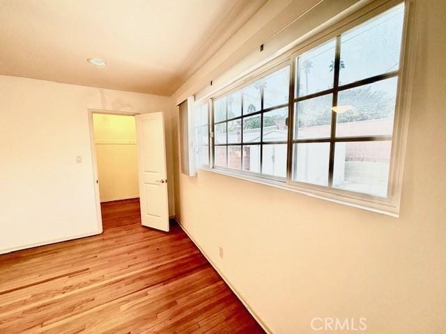 unfurnished bedroom featuring hardwood / wood-style floors