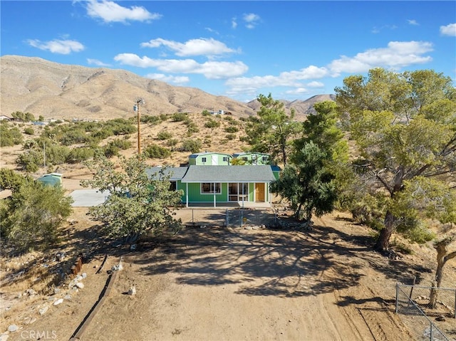 exterior space featuring a mountain view