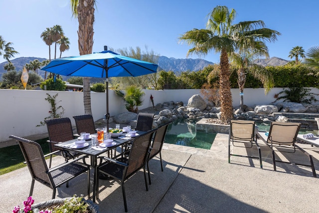 view of patio featuring a mountain view