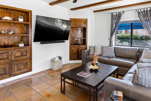 tiled living room with beamed ceiling