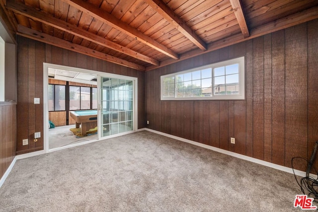 carpeted spare room featuring billiards, wood ceiling, beam ceiling, and wood walls