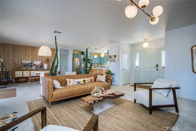 living room with an inviting chandelier