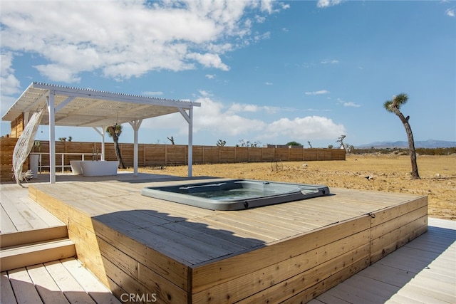 wooden deck featuring a pergola