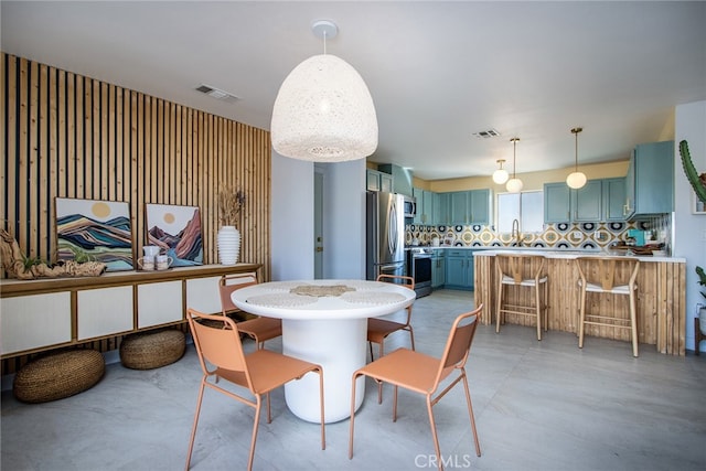 dining room featuring sink