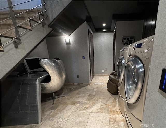 laundry room with washing machine and dryer