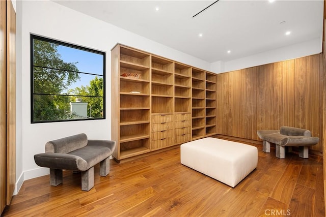 sitting room featuring light hardwood / wood-style floors