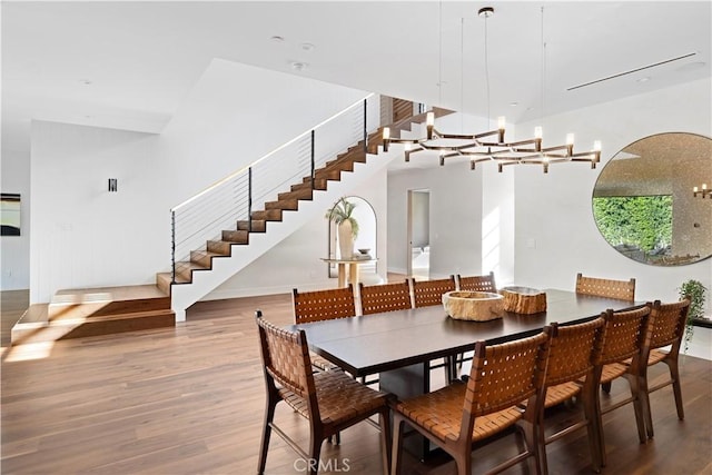 dining space featuring hardwood / wood-style flooring