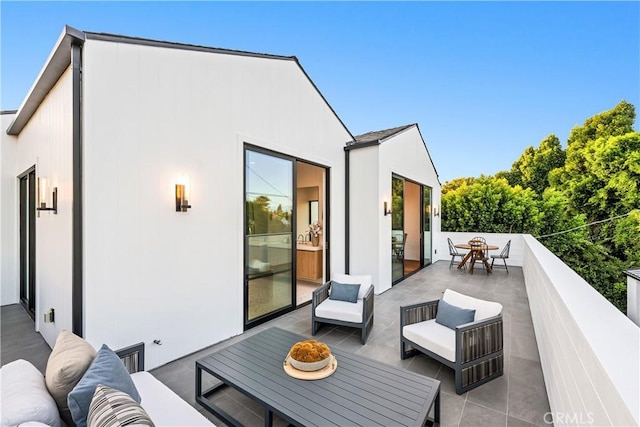 exterior space featuring an outdoor living space