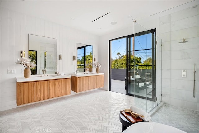 bathroom featuring vanity and walk in shower