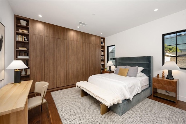 bedroom featuring hardwood / wood-style flooring